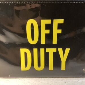 Kate Spade TAXI OFF DUTY purse, clutch.  I used for decor.